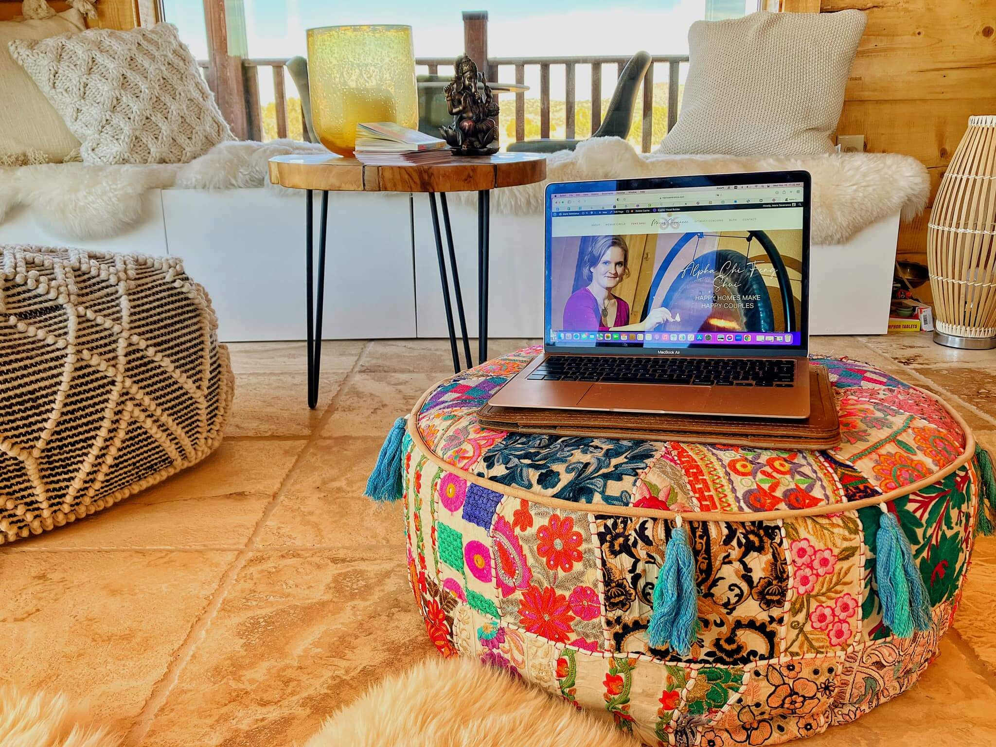 living room, carpet, computer on meditation cushion