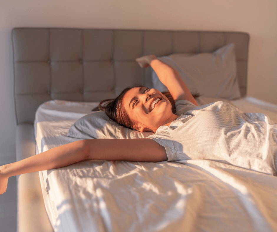 morning routine, woman stretching in bed